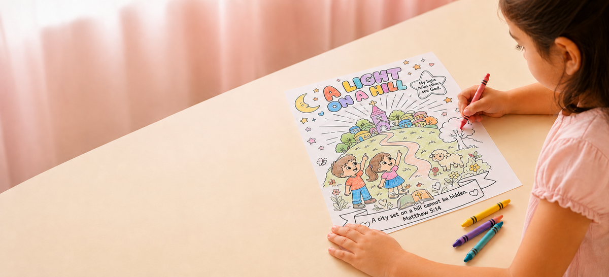 A girl coloring in the A Light On A Hill page at a table, with crayons beside her